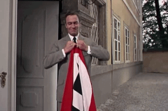 Kill all nazis Mr. Vonn Trapp from "The Sound of Music" ripping a n@zi flag in half